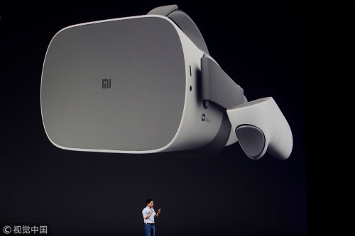 Xiaomi Founder Lei Jun introduces a new VR headset during a product launch in Shenzhen, May 31, 2018.