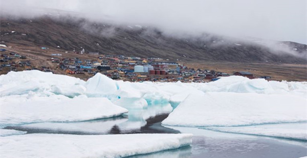 渐渐“融化”的北极偏远小镇
